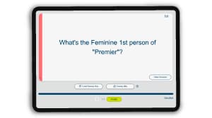 Tablet screen displaying a language learning app question, "What's the Feminine 1st person of 'Premier'?" with options to view answer, hints, and finish.