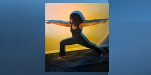 Blog author Elanah in a Warrior yoga pose.