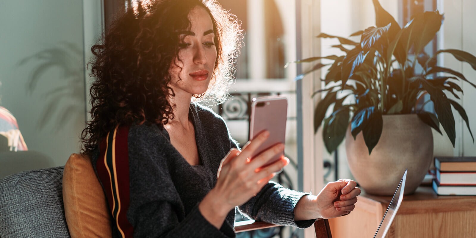 Young woman looking at her smartphone
