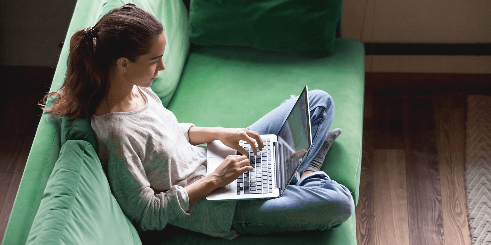 Woman looking at her computer.