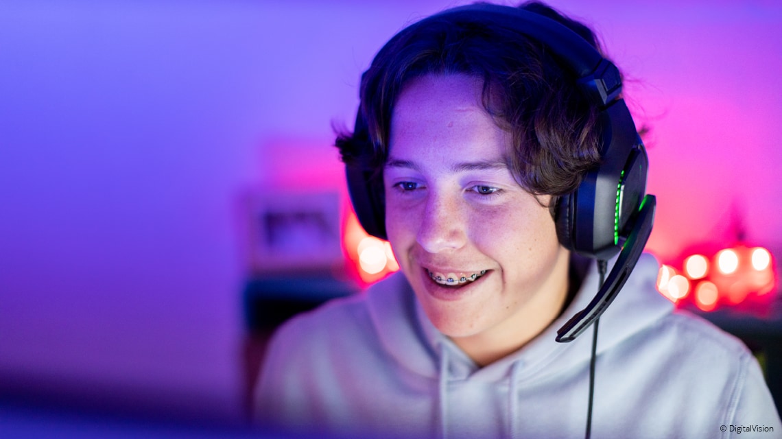 Photograph of a boy working on the computer