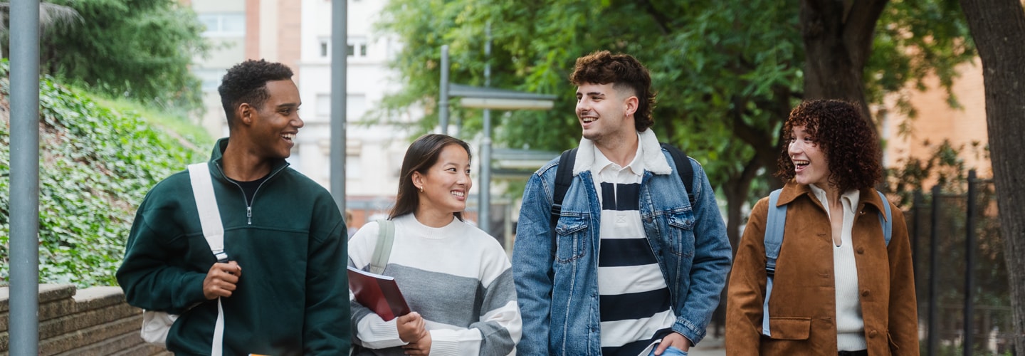 Students walking together outside talking