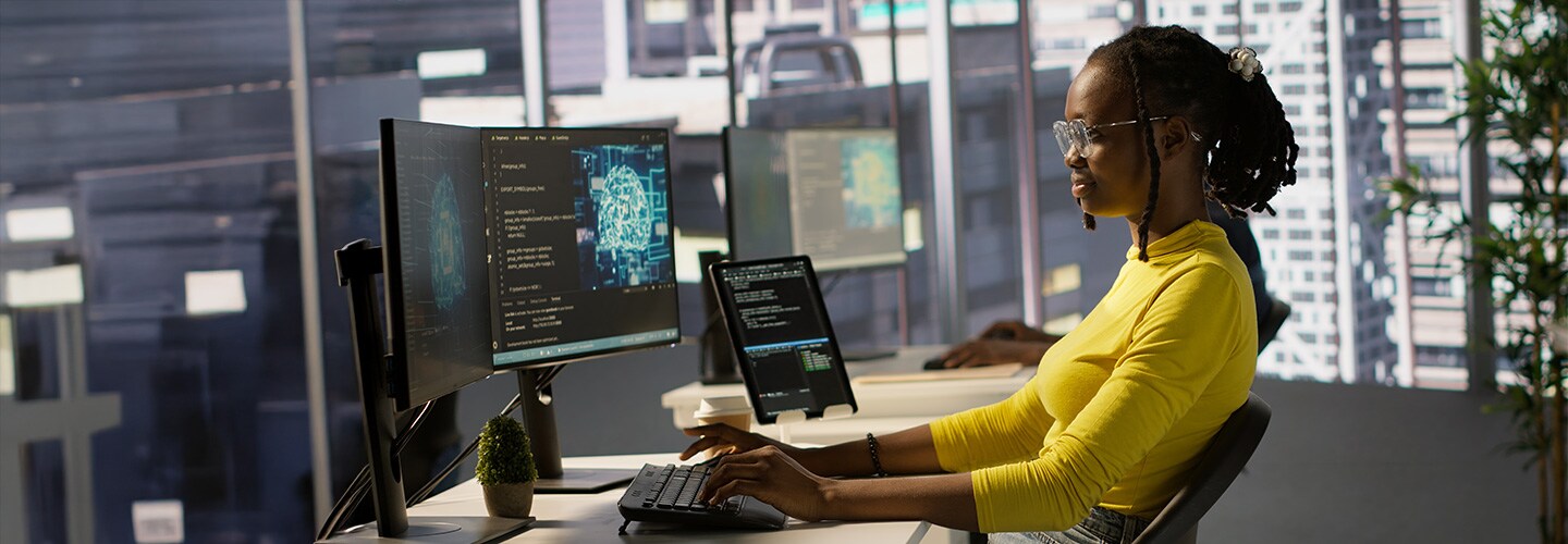 Woman uses AI on computer