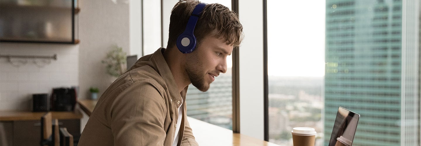 Man studying and writing notes