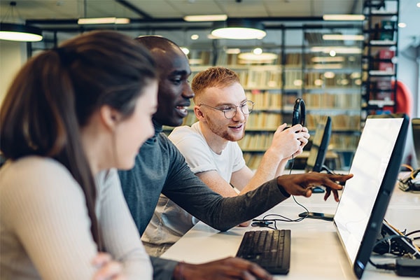Man studying and writing notes